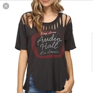 ISO FREE PEOPLE TORN UP TEE.